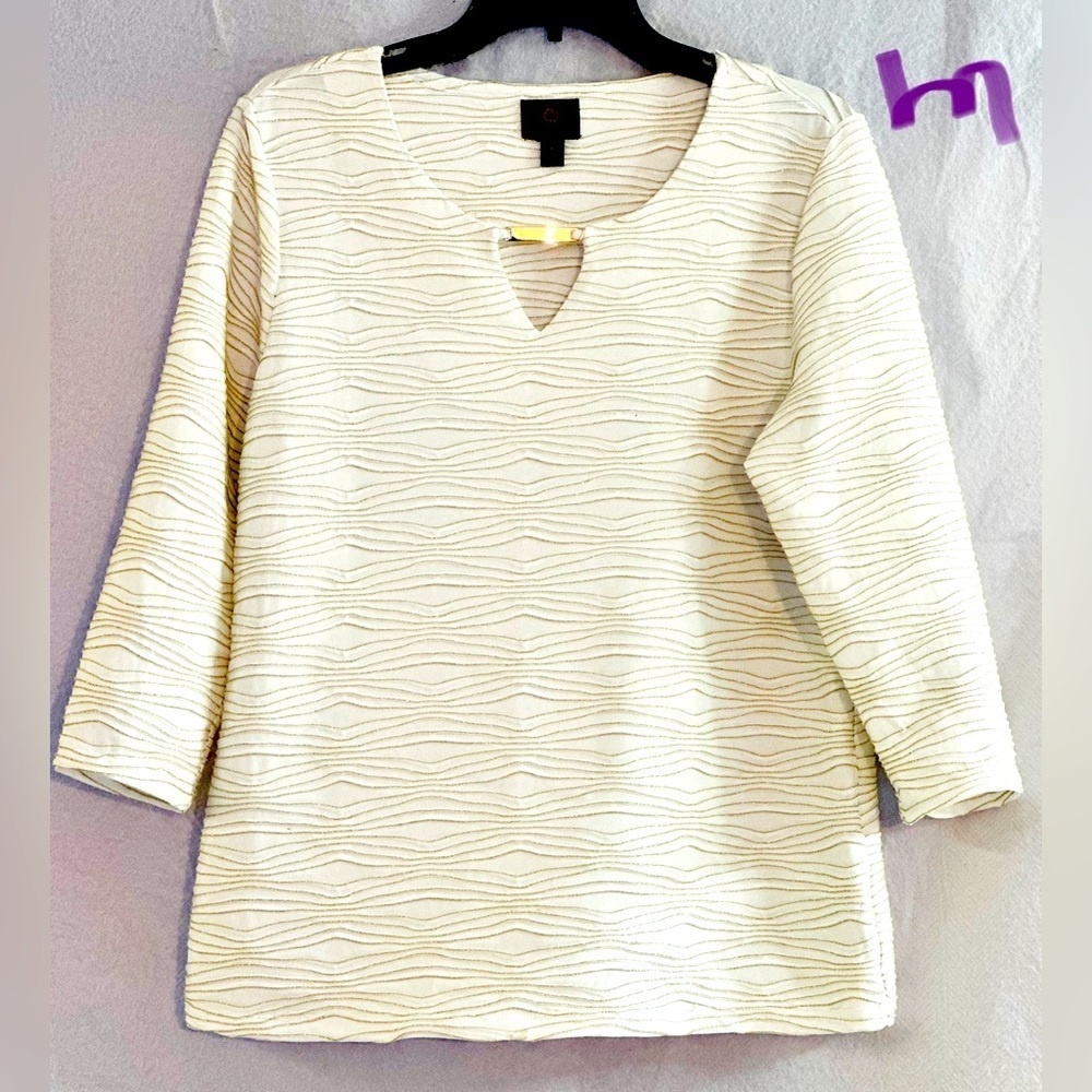LADIES WHITE TOP WITH GOLD SPARKLY STRIPES AND A METAL NECKLINE